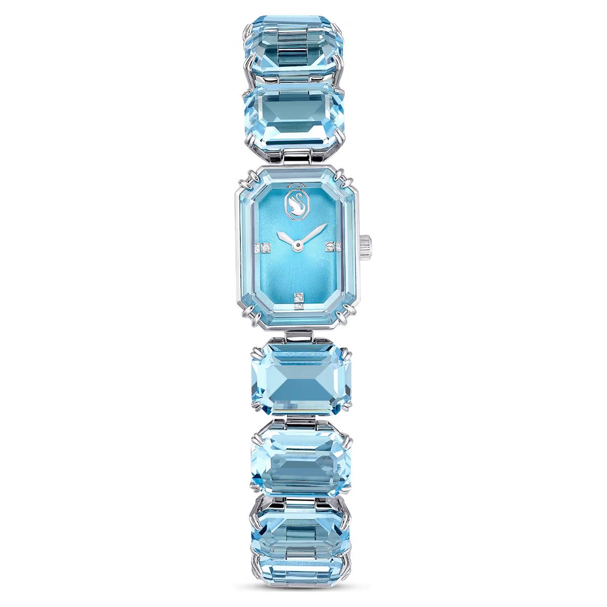 Luxury watch with blue gemstones on a white background