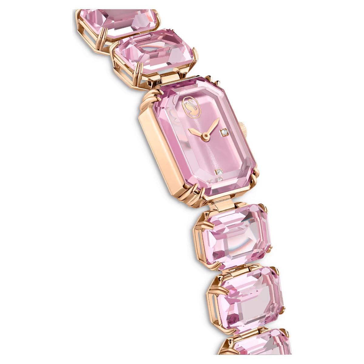 Pink gemstone bracelet with gold accents on a white background