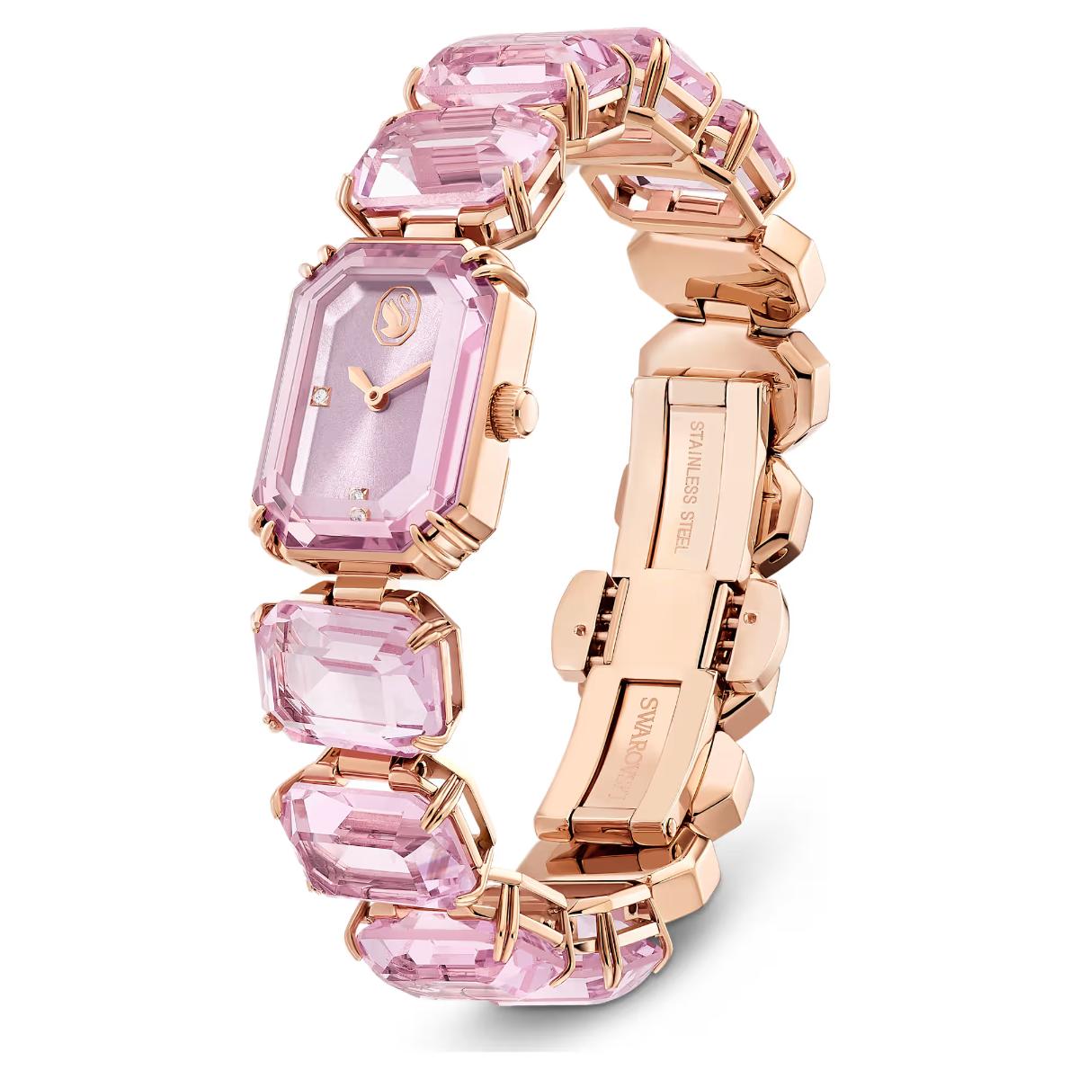 Luxury watch with pink gemstones and rose gold casing on a white background