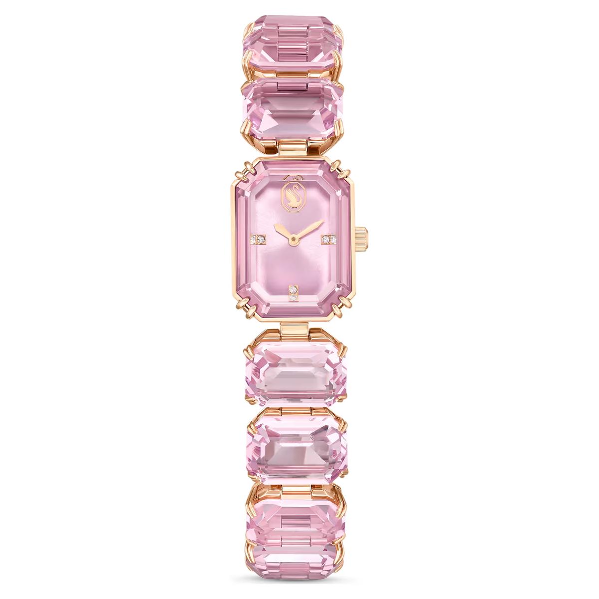 Pink gemstone watch with gold accents on a white background
