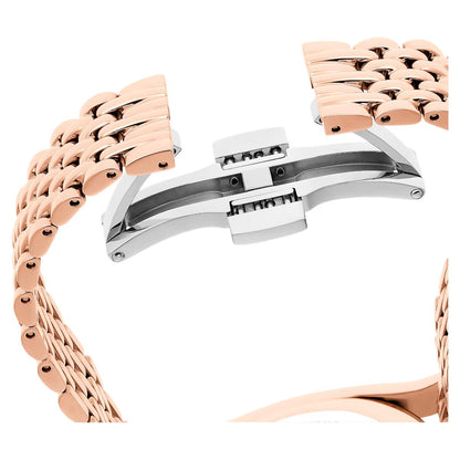 Rose gold and silver watch strap on a white background