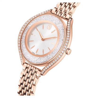 Rose gold watch with a decorative face on a white background