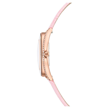Watch with a pink strap and rose gold case on a white background