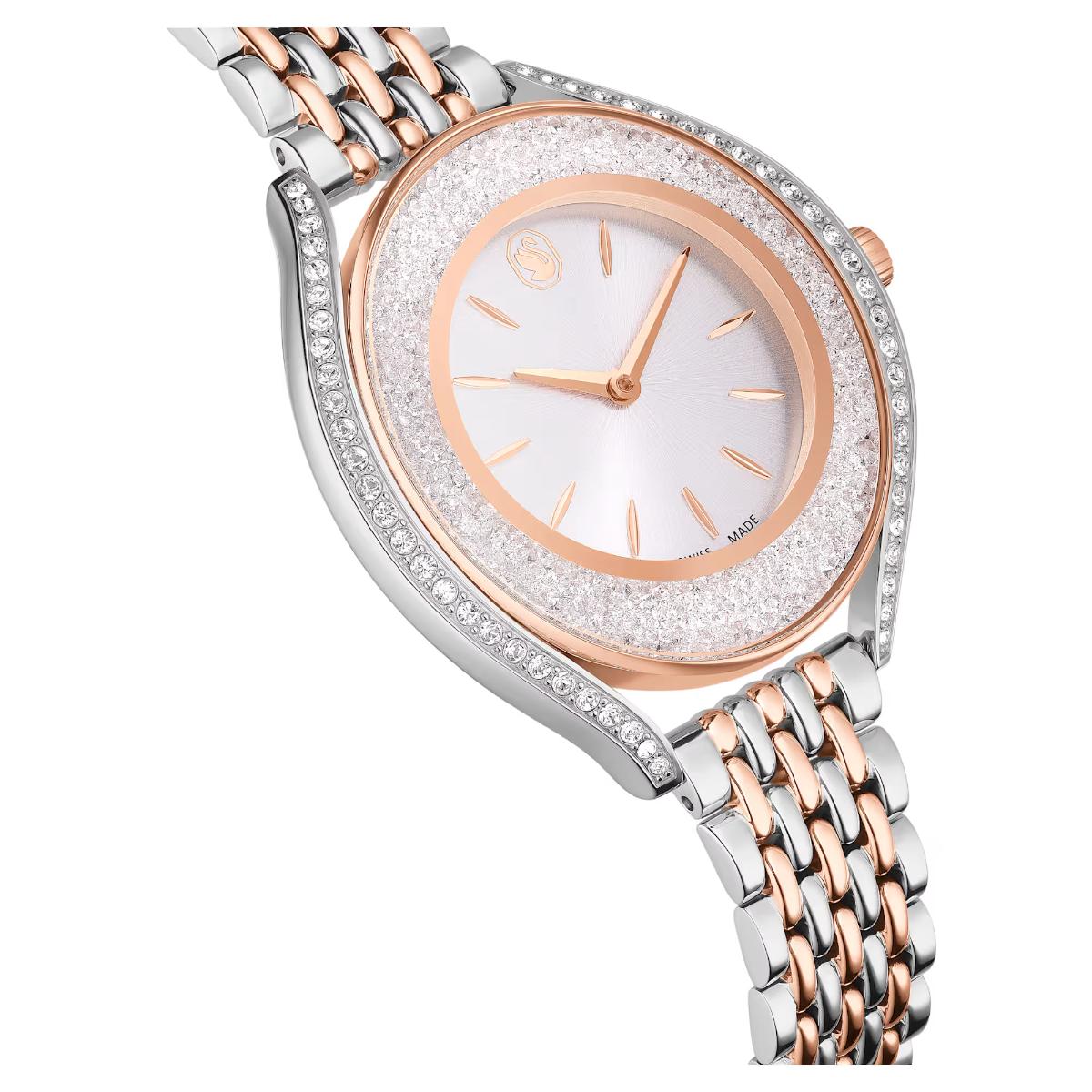 Two-tone watch with rose gold and silver band on a white background