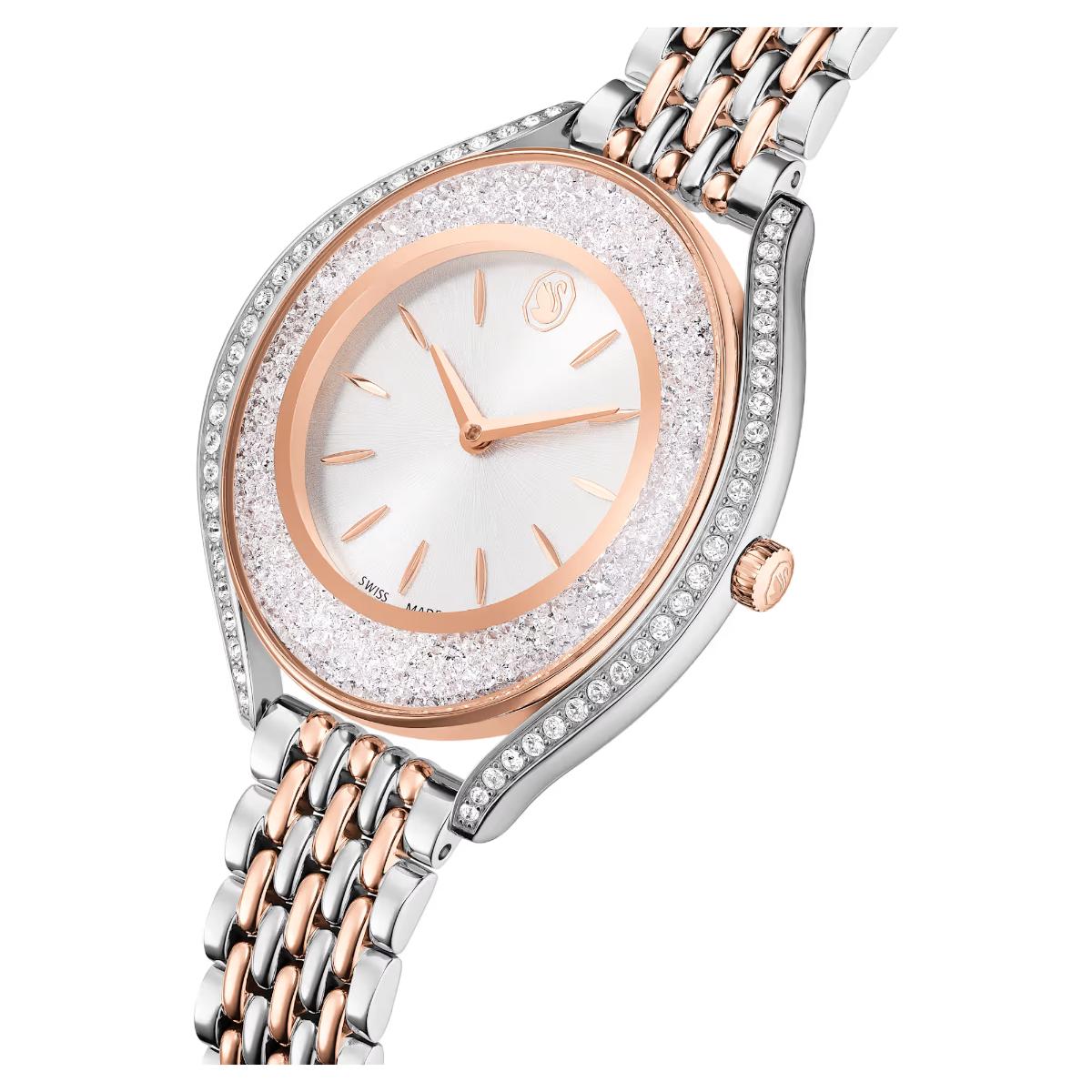 Luxury watch with rose gold and silver band on a white background