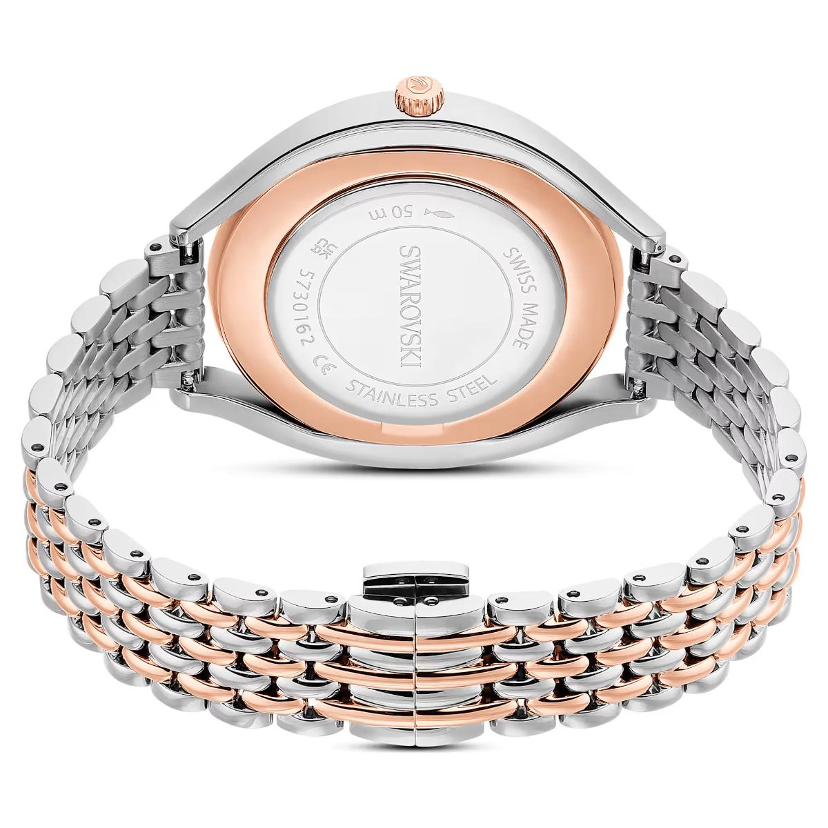 Swarovski watch with two-tone metal band on a white background