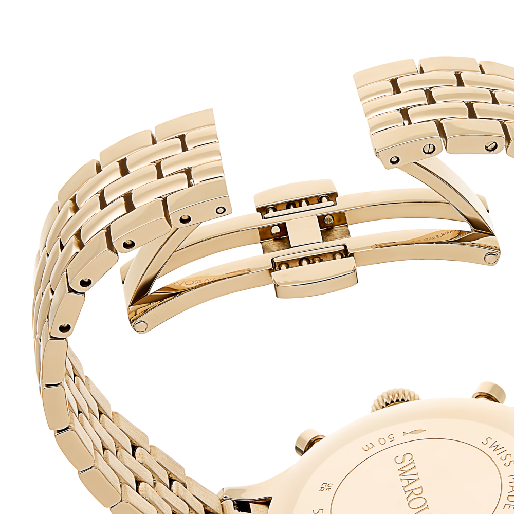 Gold watch with a detailed metal band on a white background