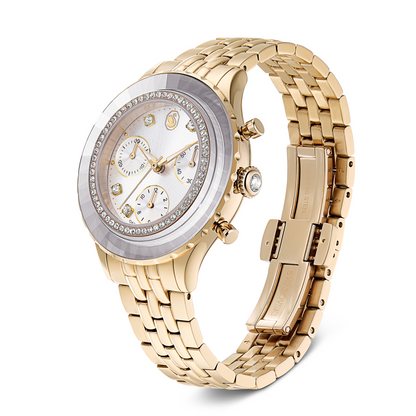 Gold watch with a detailed face on a white background