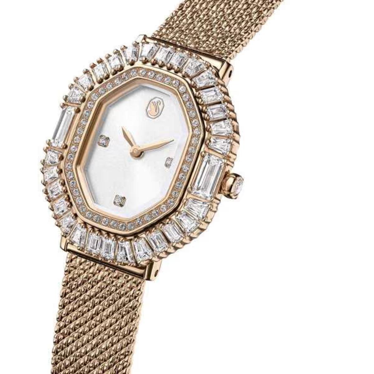 Rose gold watch with diamond-studded bezel on a white background