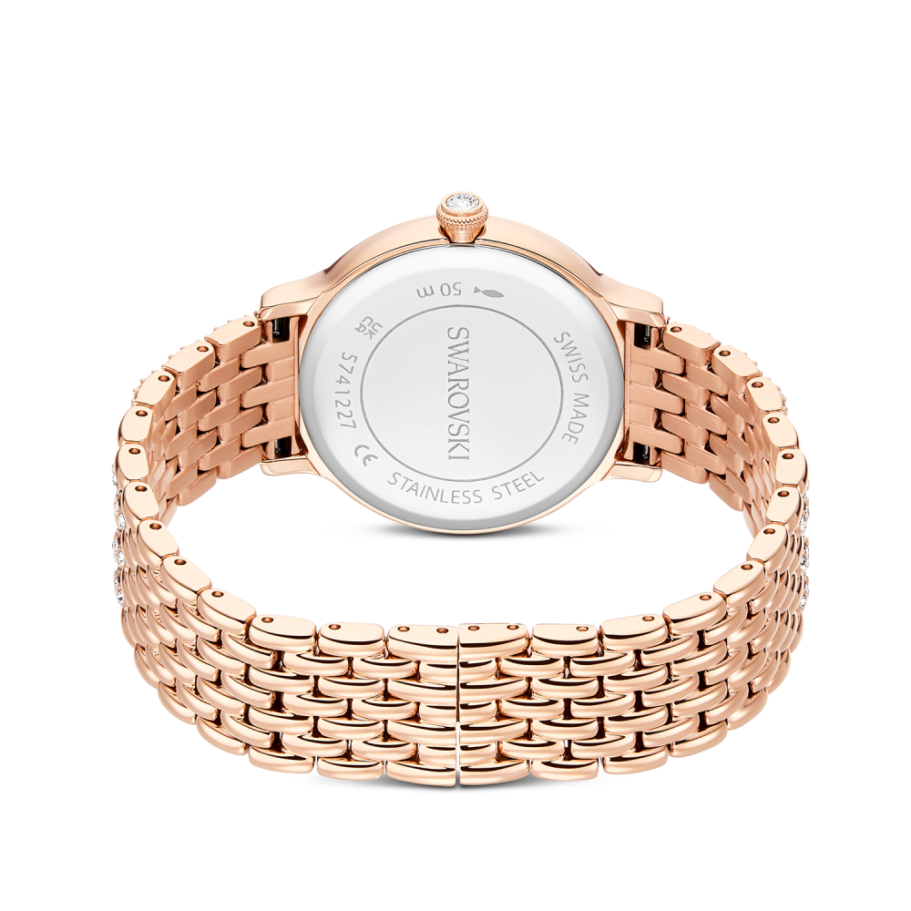 Rose gold Swarovski watch on a white background