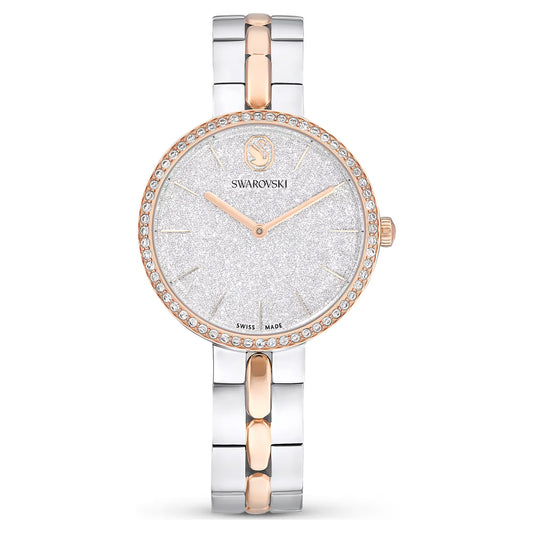 Swarovski watch with silver and rose gold band on a white background