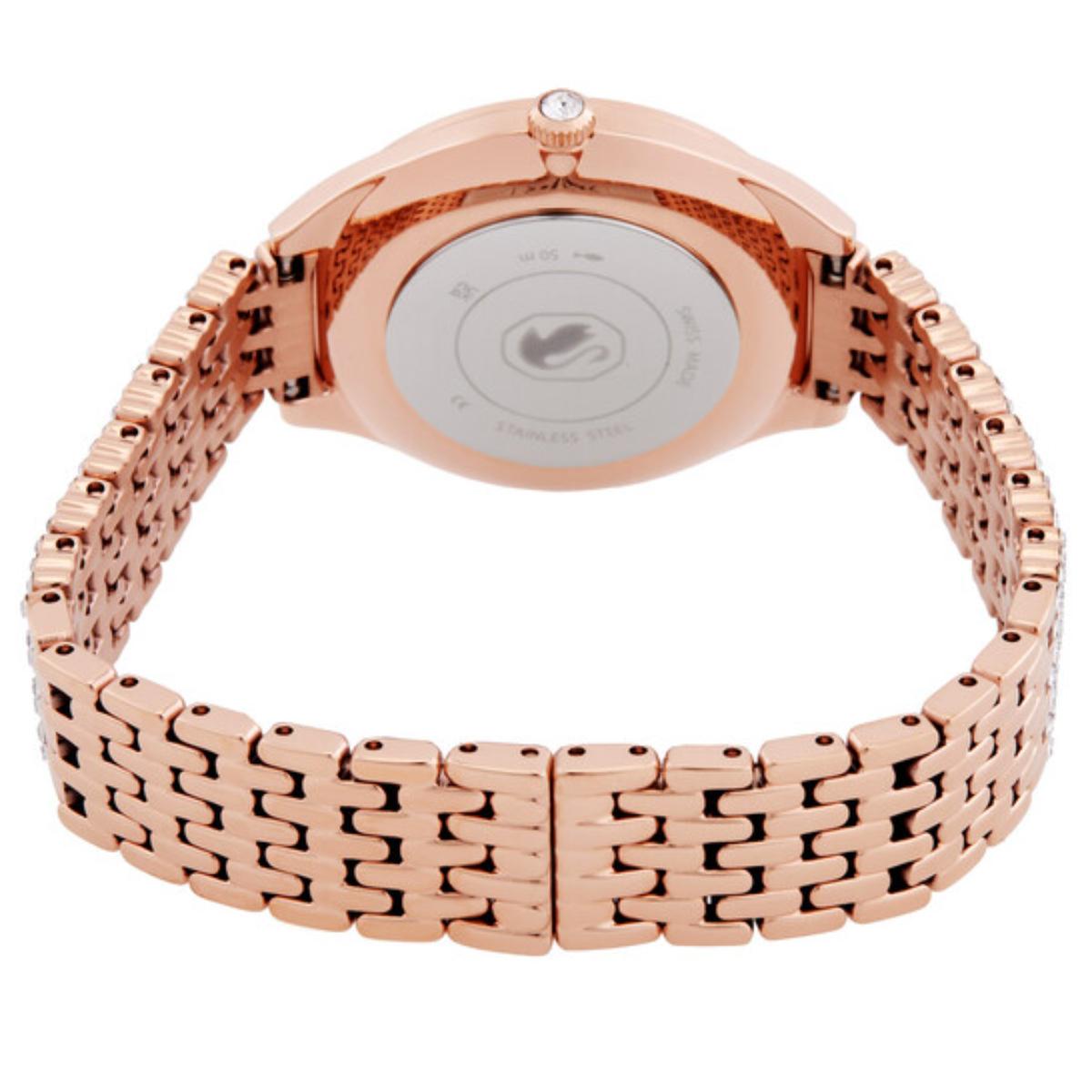 Rose gold watch with a white face on a white background