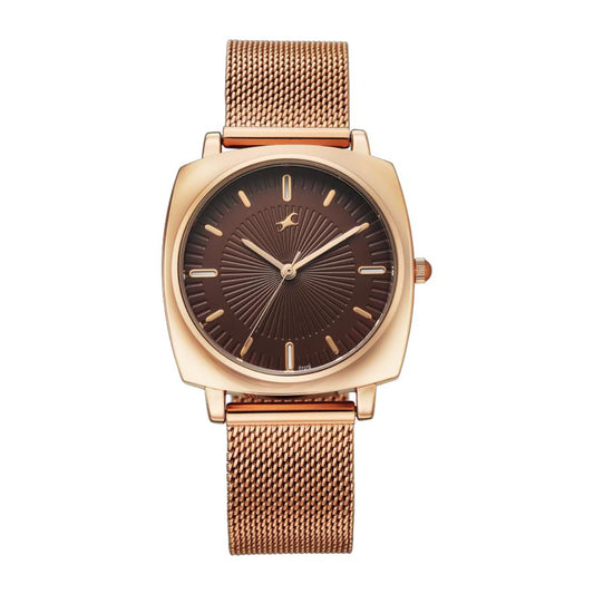 Rose gold watch with a brown face on a white background
