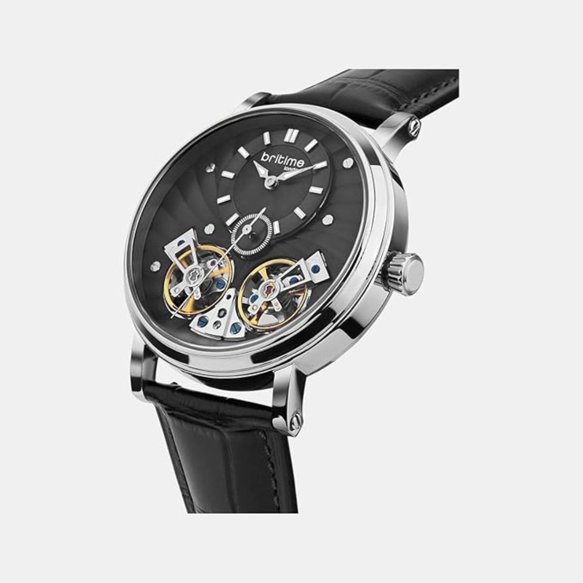 Black wristwatch with visible mechanical components on a white background