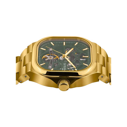Gold wristwatch with a green face on a white background
