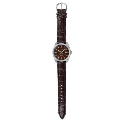Watch with a brown leather strap on a white background