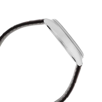 Silver bracelet on a light gray background