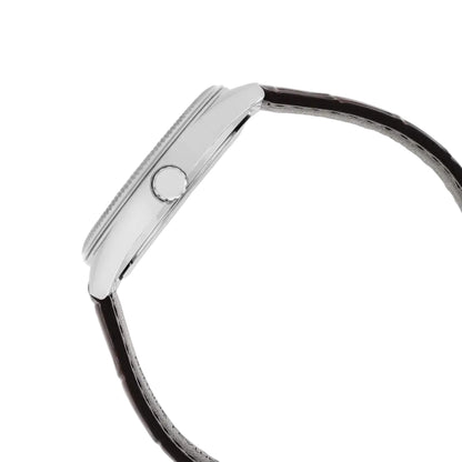 Close-up of a silver bracelet on a light gray background