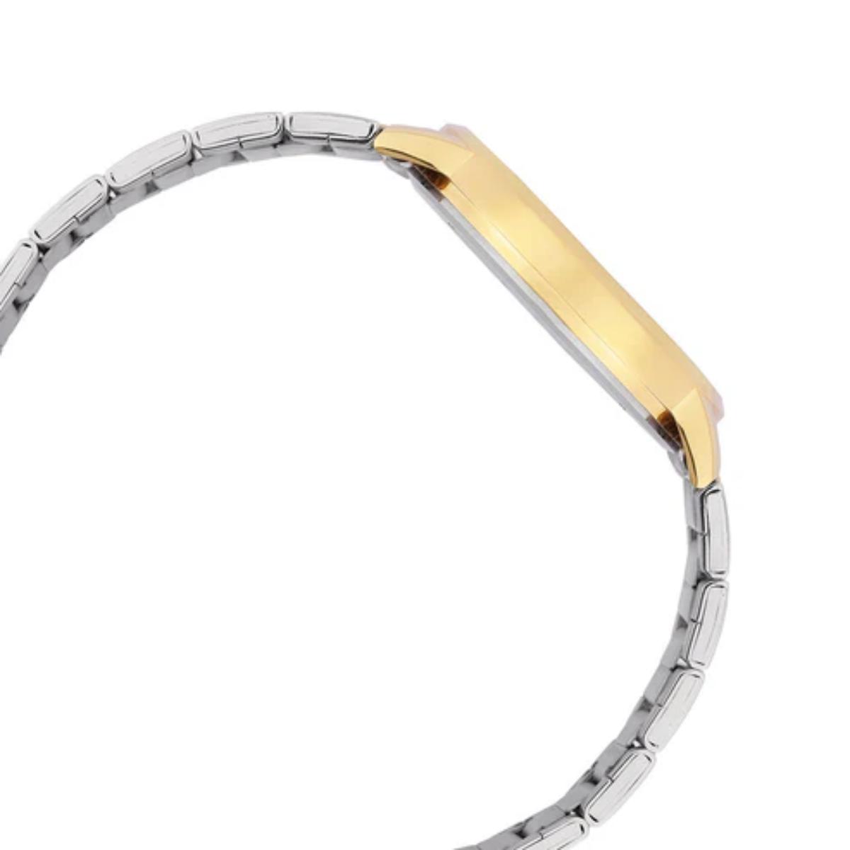 Two-tone gold and silver bracelet on a white background