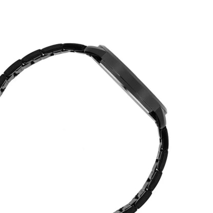 Black metal bracelet on a white background