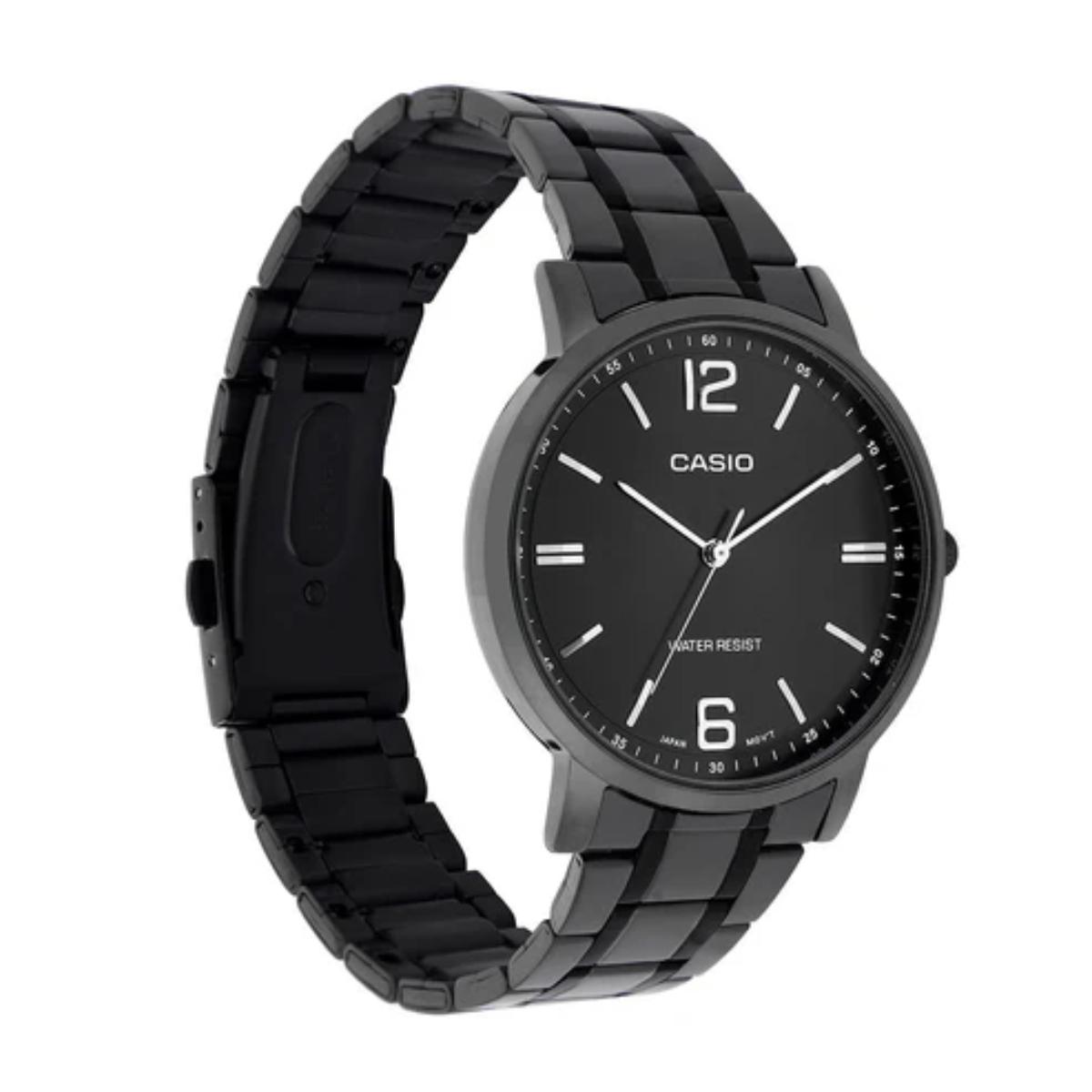 Black Casio watch with a metal strap on a white background