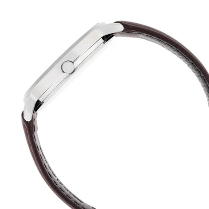 Close-up of a silver watch band with brown leather strap on a white background