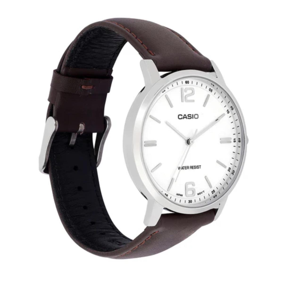 Casio watch with a brown leather strap on a white background