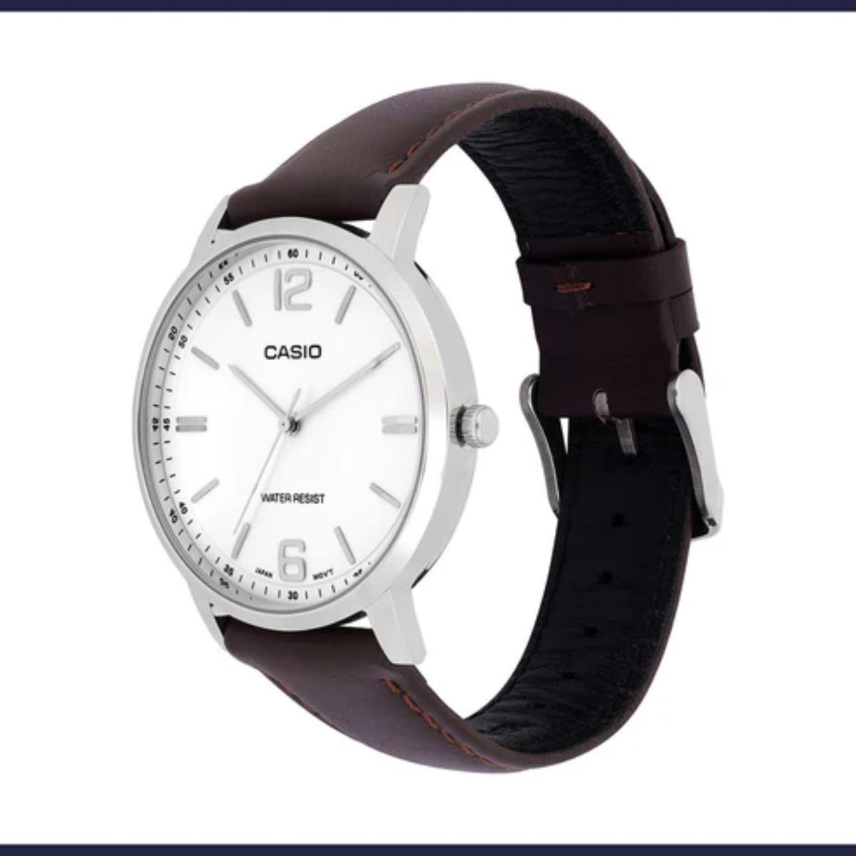 Casio watch with brown leather strap on a white background