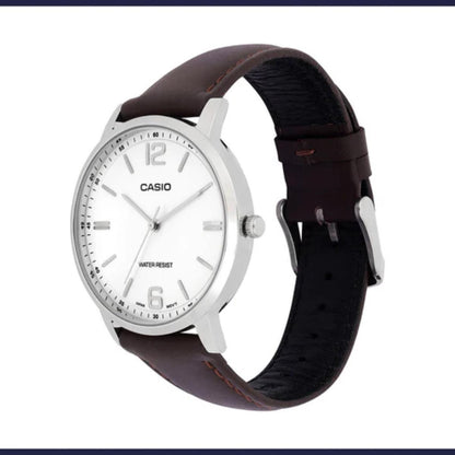 Casio watch with brown leather strap on a white background