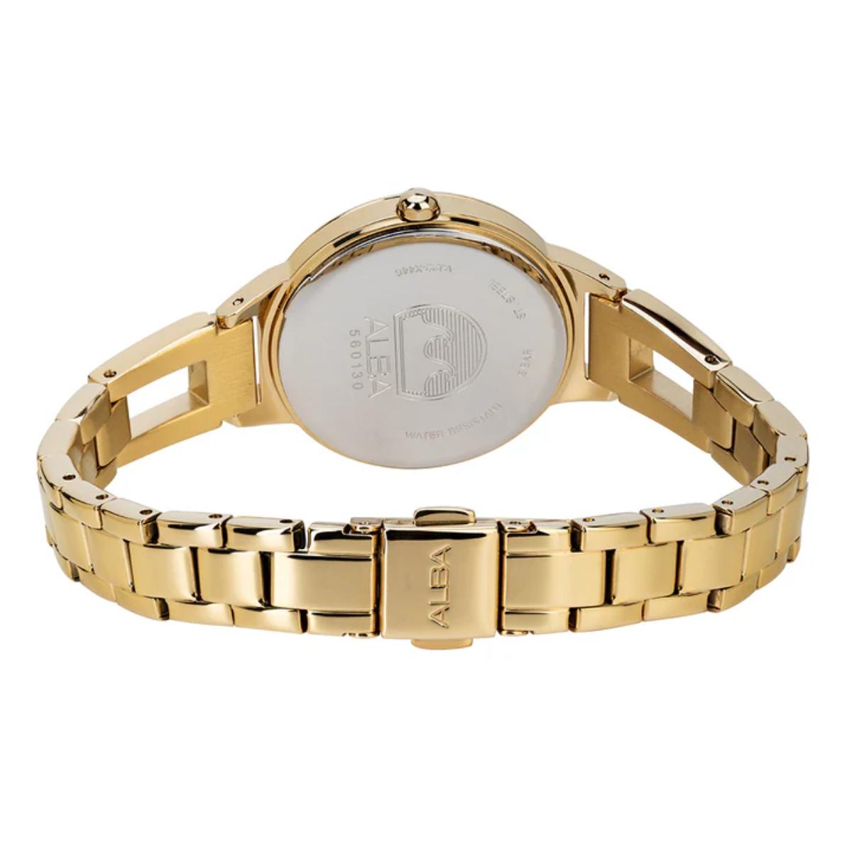 Gold watch with a white face on a white background