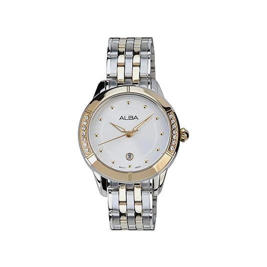 Silver and gold watch with a white face on a light gray background