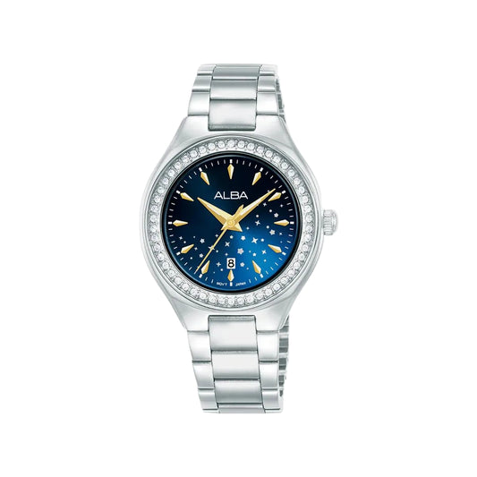 Silver watch with a blue dial featuring star and moon design on a white background, brand 'Alba' visible.