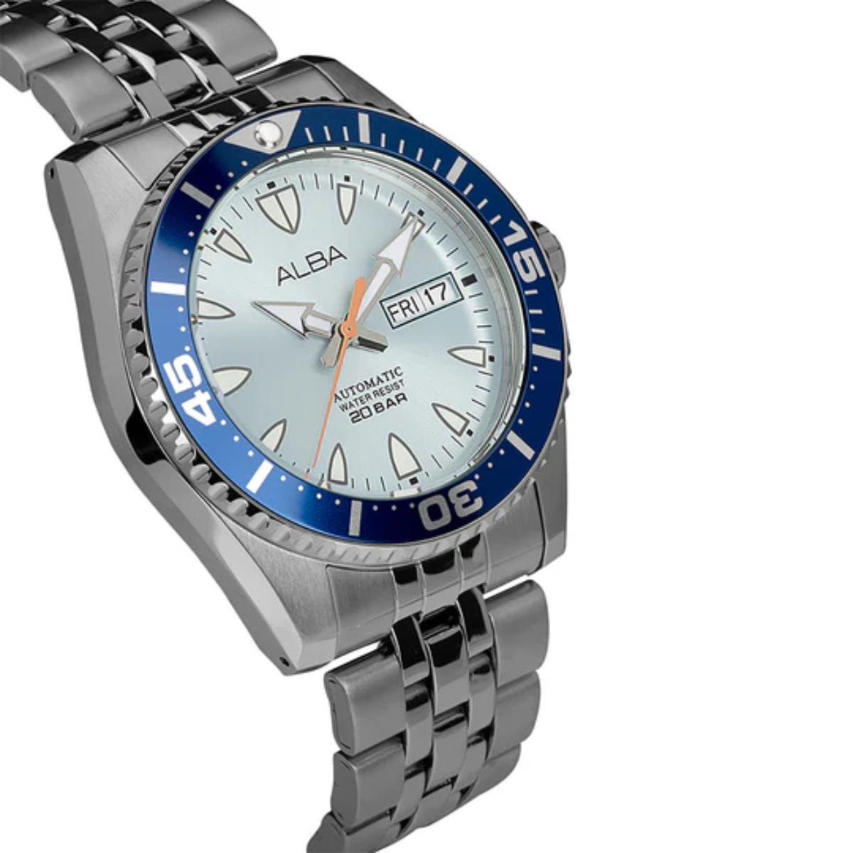 Silver watch with blue bezel and white face on a white background