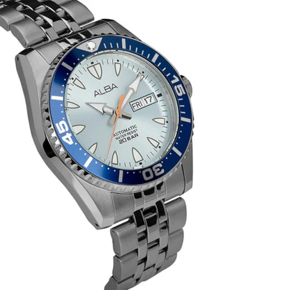 Silver watch with blue bezel and white face on a white background