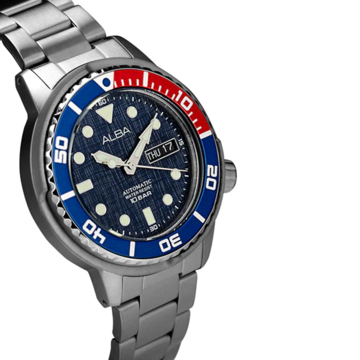 Watch with blue and red bezel on a white background
