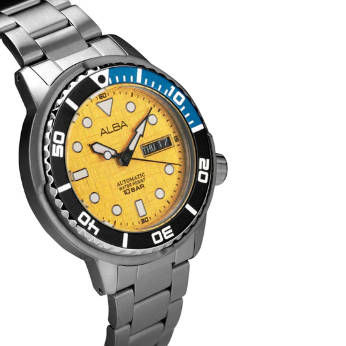 Watch with a yellow face and silver metal strap on a white background
