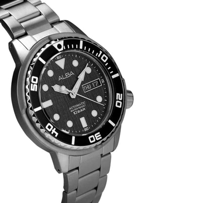 Silver watch with black dial on a white background