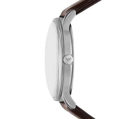 Close-up of a watch with a brand logo on a white background