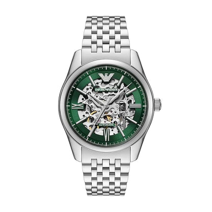 Silver watch with green face on a white background