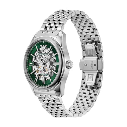Silver watch with a green face on a white background