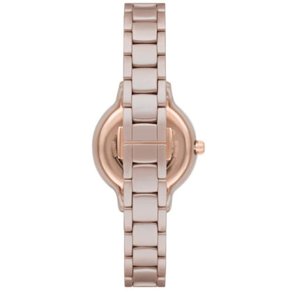 Rose gold watch with a white background