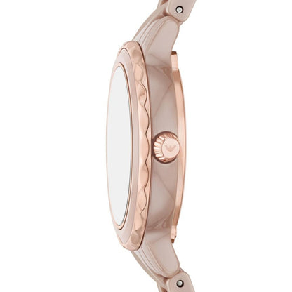 Rose gold watch on a white background