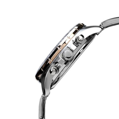 Close-up of a silver watch with a white background