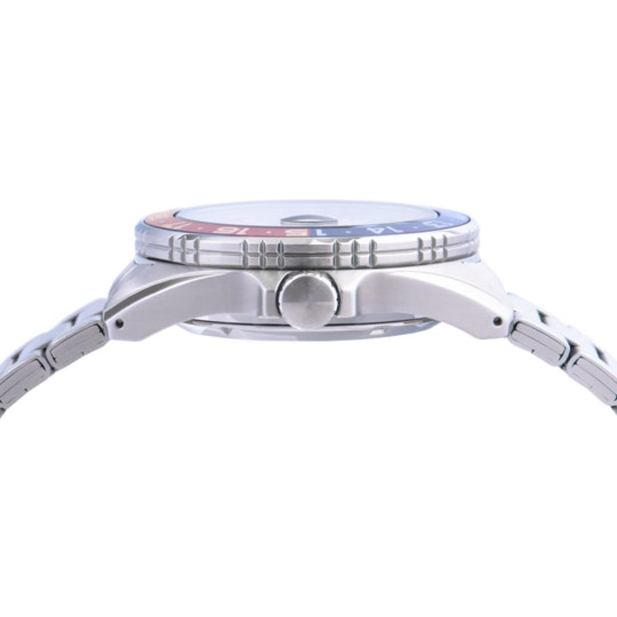 Close-up of a silver watch with a white face on a white background