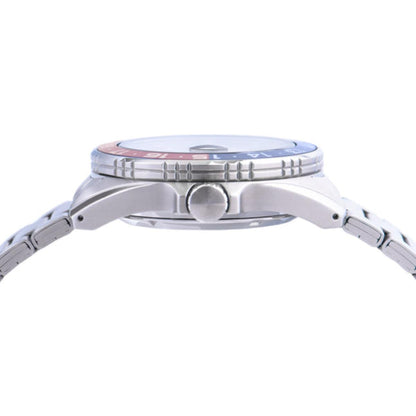 Close-up of a silver watch with a white face on a white background