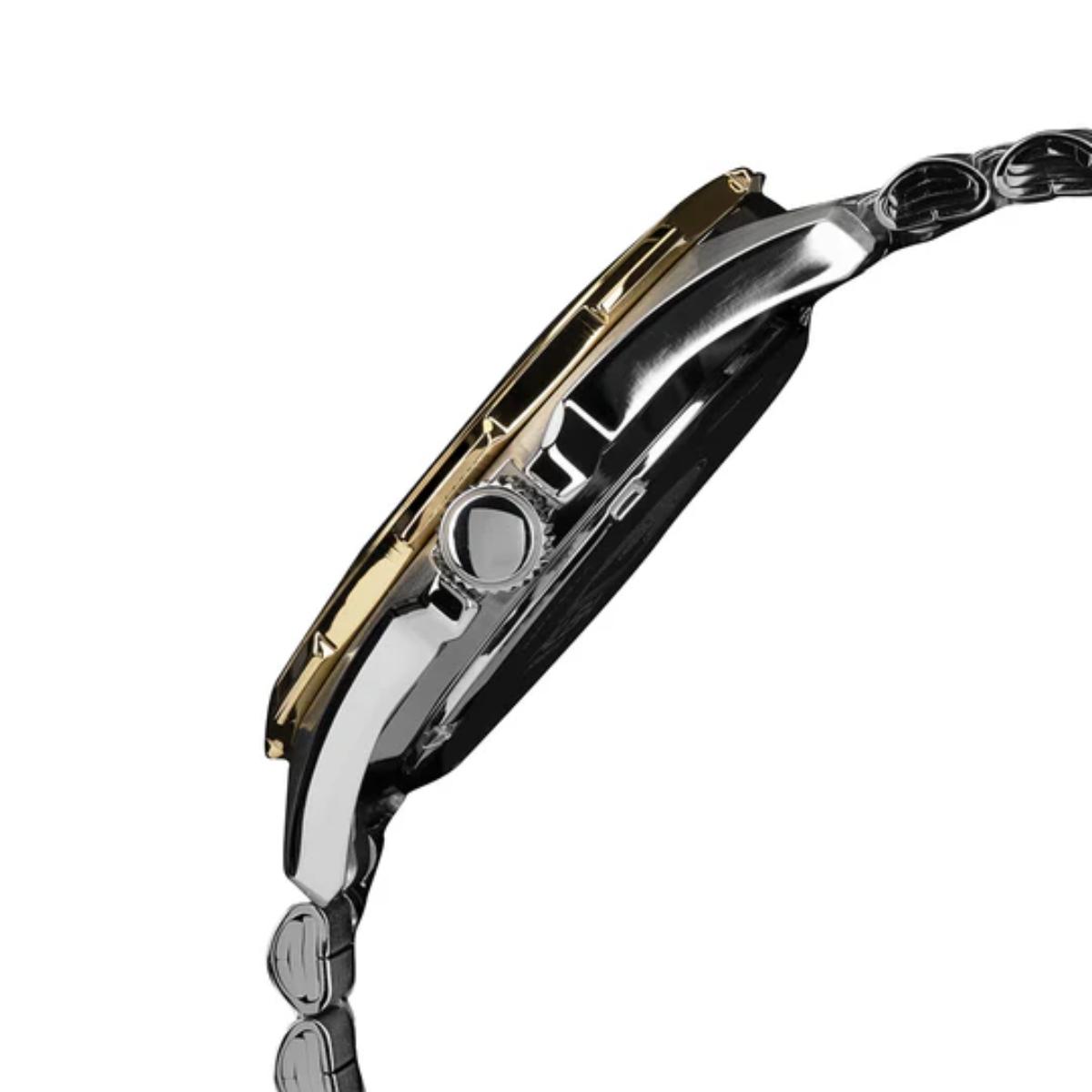 Close-up of a watch with a metallic band on a white background