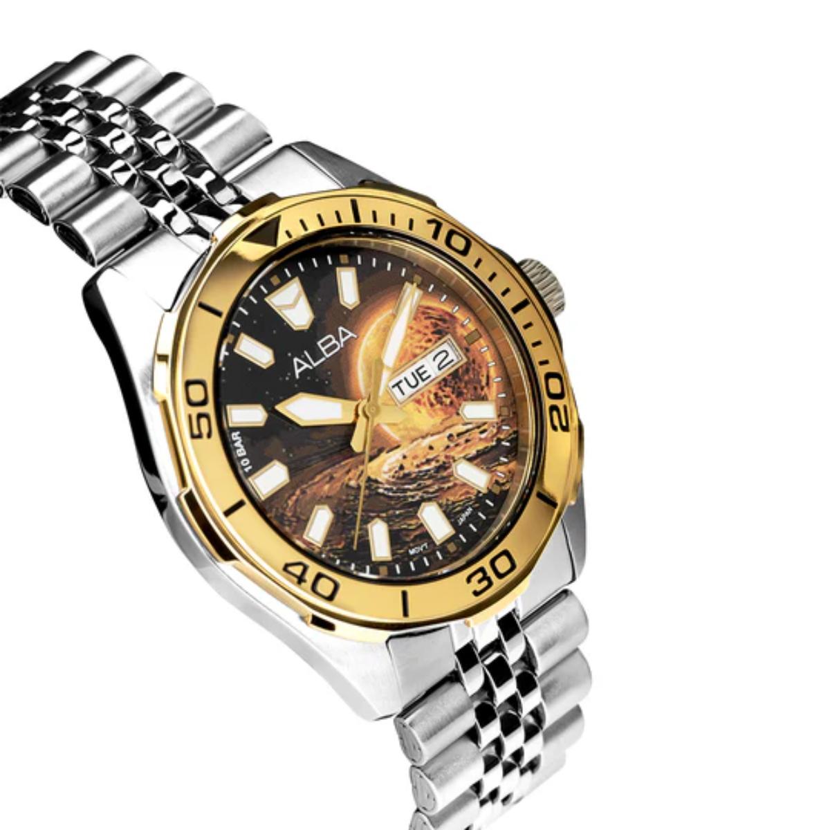 Silver and gold watch with a detailed face on a white background