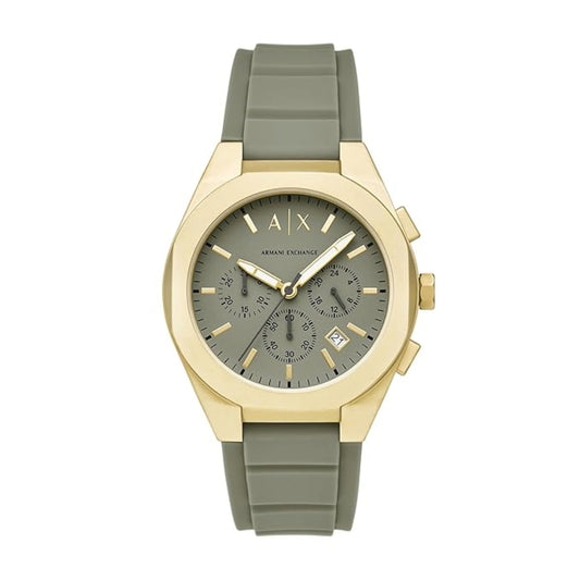 Watch with gold case and green silicone strap on a white background