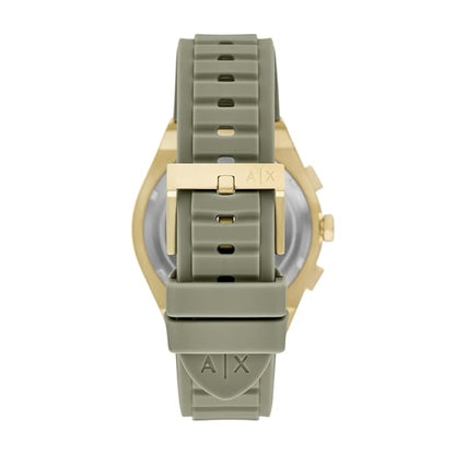 Watch with green strap and gold case on a white background