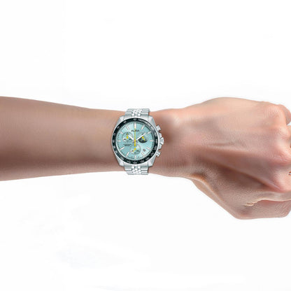 Silver watch on a wrist with a white background